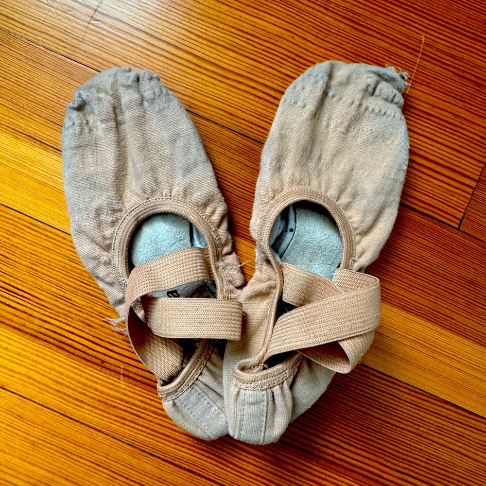 Worn out ballet slipperss